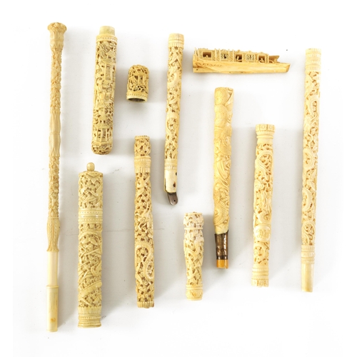 75 - A COLLECTION OF 19TH CENTURY CARVED CANTONESE IVORY ITEMS including two needle cases, seven parasol ... 