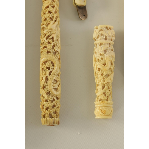 75 - A COLLECTION OF 19TH CENTURY CARVED CANTONESE IVORY ITEMS including two needle cases, seven parasol ... 