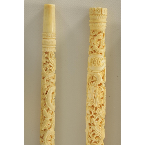 75 - A COLLECTION OF 19TH CENTURY CARVED CANTONESE IVORY ITEMS including two needle cases, seven parasol ... 