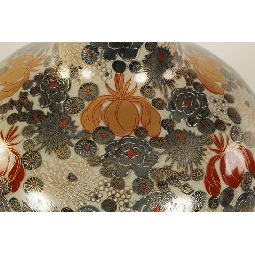 77 - A LATE MEIJI PERIOD JAPANESE SATSUMA VASE decorated with flower heads high-lighted in gilt - signed ... 