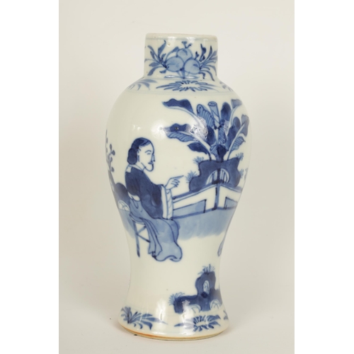 78 - A SMALL 18TH/19TH CENTURY CHINESE BLUE AND WHITE VASE of baluster form decorated with two seated lad... 