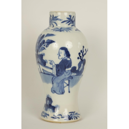 78 - A SMALL 18TH/19TH CENTURY CHINESE BLUE AND WHITE VASE of baluster form decorated with two seated lad... 