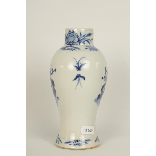 78 - A SMALL 18TH/19TH CENTURY CHINESE BLUE AND WHITE VASE of baluster form decorated with two seated lad... 