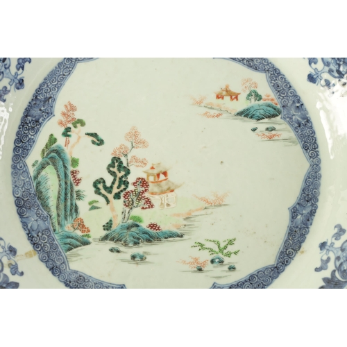 79 - AN 18TH CENTURY CHINESE BLUE AND WHITE SCALLOP EDGE DISH with hatched floral panelled border and inn... 