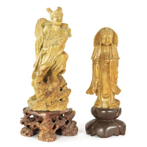 80 - TWO CHINESE SOAPSTONE FIGURAL CARVINGS modelled as mortals on carved bases (2) (Tallest 31cm high)