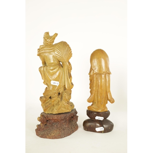 80 - TWO CHINESE SOAPSTONE FIGURAL CARVINGS modelled as mortals on carved bases (2) (Tallest 31cm high)