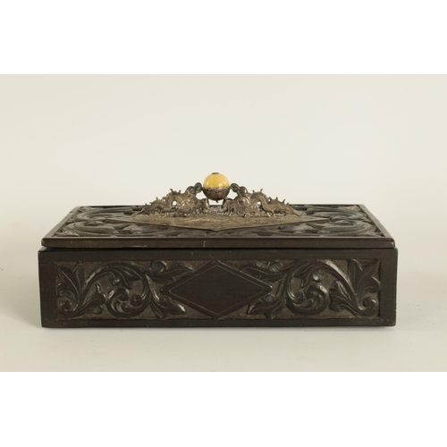 84 - A 19TH CENTURY CHINESE CARVED HARDWOOD (POSSIBLY ZITAN) LIDDED BOX with embossed silver-metal handle... 