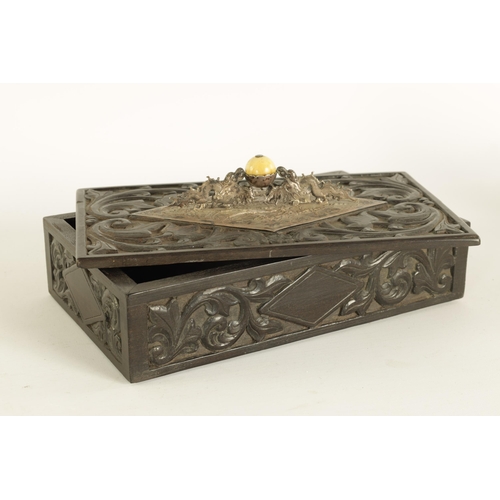 84 - A 19TH CENTURY CHINESE CARVED HARDWOOD (POSSIBLY ZITAN) LIDDED BOX with embossed silver-metal handle... 