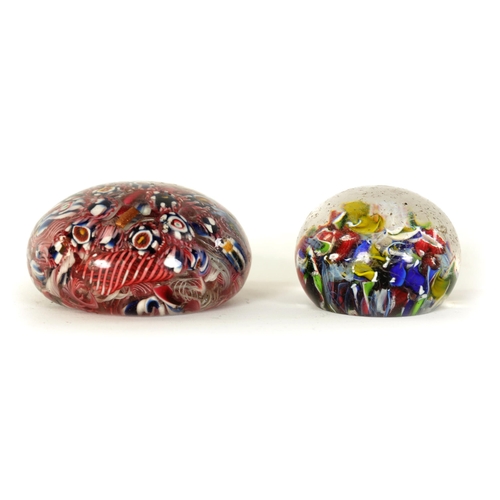 9 - TWO LATE 19TH/EARLY 20TH CENTURY GLASS PAPERWEIGHTS brightly decorated with colourful flower heads. ... 