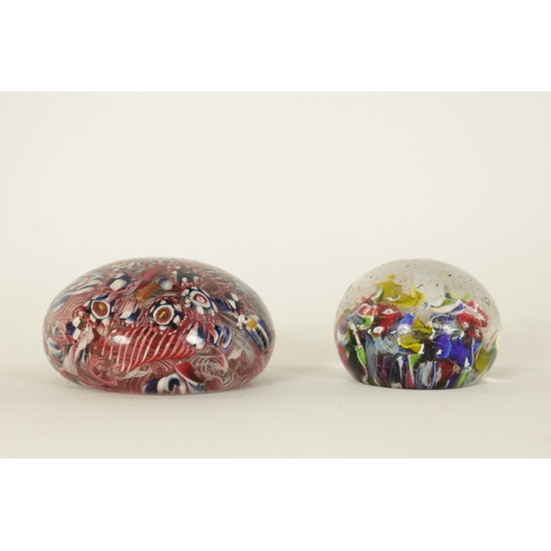 9 - TWO LATE 19TH/EARLY 20TH CENTURY GLASS PAPERWEIGHTS brightly decorated with colourful flower heads. ... 