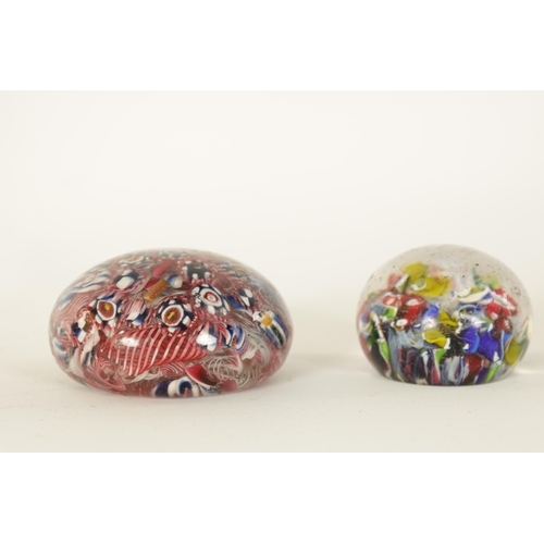 9 - TWO LATE 19TH/EARLY 20TH CENTURY GLASS PAPERWEIGHTS brightly decorated with colourful flower heads. ... 