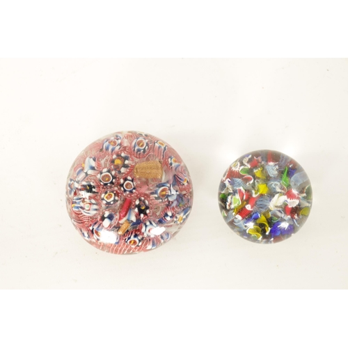 9 - TWO LATE 19TH/EARLY 20TH CENTURY GLASS PAPERWEIGHTS brightly decorated with colourful flower heads. ... 