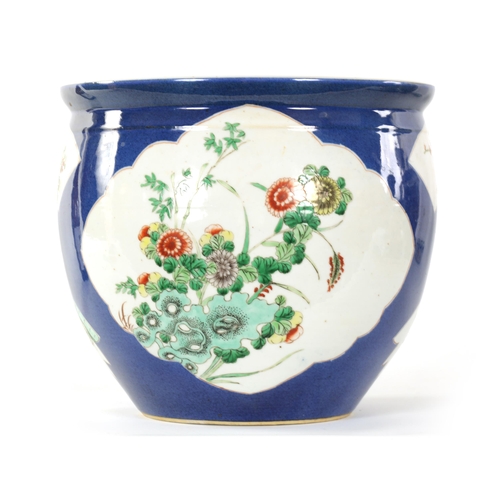 90 - A 19TH CENTURY CHINESE FAMILLE VERTE BULBOUS JARDINIERE decorated with floral panels on a blue groun... 