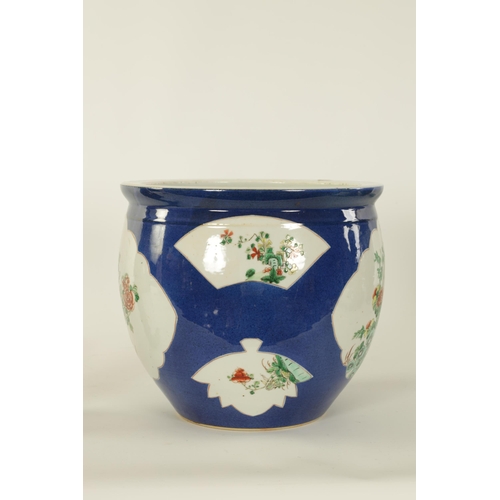 90 - A 19TH CENTURY CHINESE FAMILLE VERTE BULBOUS JARDINIERE decorated with floral panels on a blue groun... 