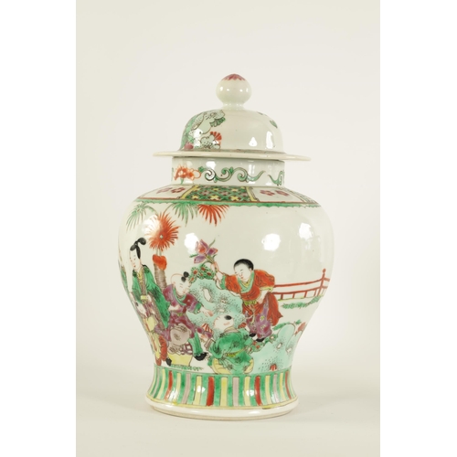 92 - A 19TH CENTURY CHINESE FAMILLE VERTE PORCELAIN JAR AND COVER of baluster form, the body painted with... 