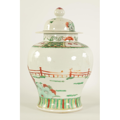 92 - A 19TH CENTURY CHINESE FAMILLE VERTE PORCELAIN JAR AND COVER of baluster form, the body painted with... 