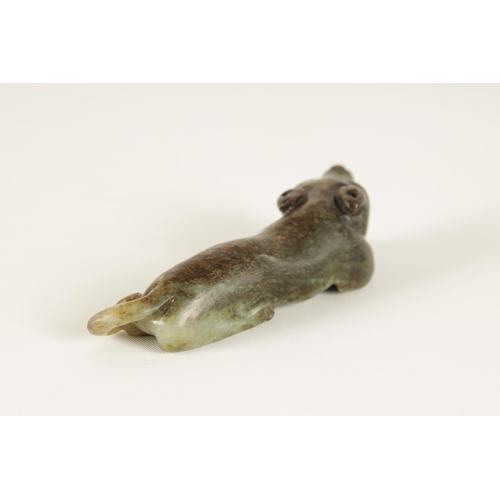 97 - A 19TH CENTURY CHINESE RUSET JADE CARVED SCULPTURE formed as a recumbent dog (7cm wide )