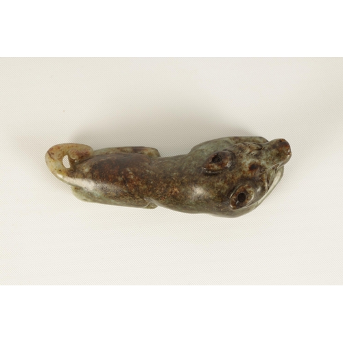 97 - A 19TH CENTURY CHINESE RUSET JADE CARVED SCULPTURE formed as a recumbent dog (7cm wide )