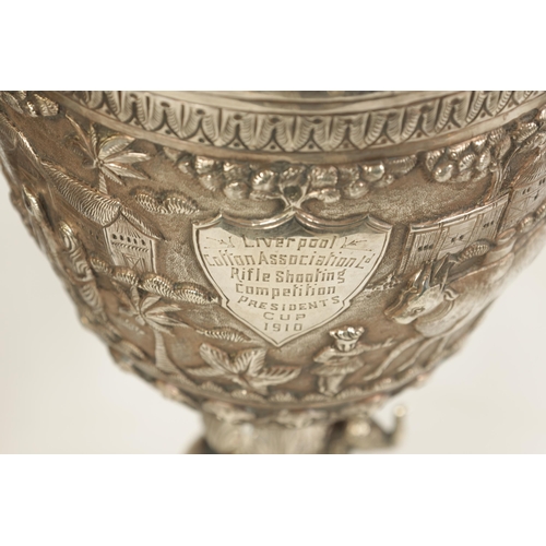 206 - AN IMPRESSIVE LATE 19TH/EARLY 20TH CENTURY ANGLO INDIAN SILVER TROPHY CUP IN A FITTED CARVED HARDWOO... 