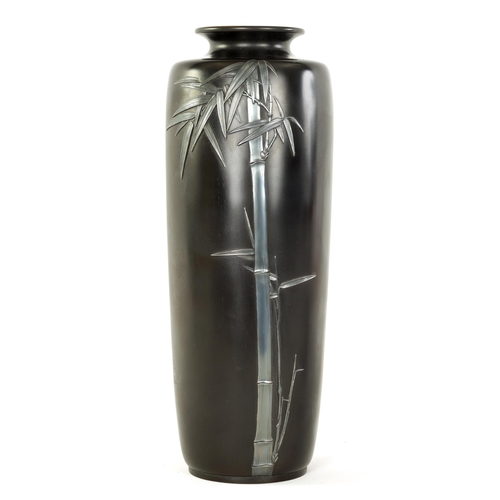 218 - A TALL JAPANESE MEIJI PERIOD SILVER INLAID BRONZE VASE of tapered cylindrical form with patinated bo... 