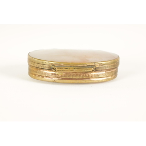 228 - AN EARLY 19TH CENTURY AGATE AND GILT BRASS PILL BOX of oval form with slightly domed agate panels an... 