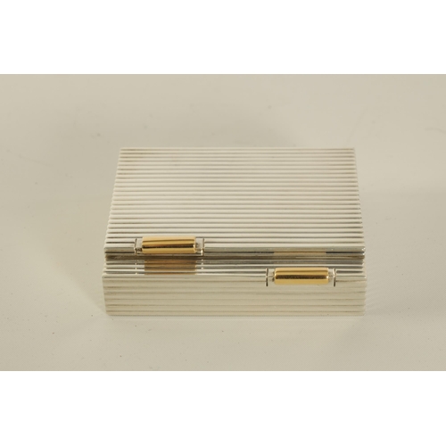 230 - CARTIER, PARIS A MID 20TH CENTURY FRENCH SILVER AND GOLD MOUNTED LADIES POWDER COMPACT the ribbed bo... 