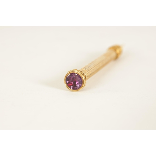 231 - A 9CT GOLD SAMPSON MORDAN & CO. PROPELLING PENCIL the signed shaft with engine-turned decoration, re... 