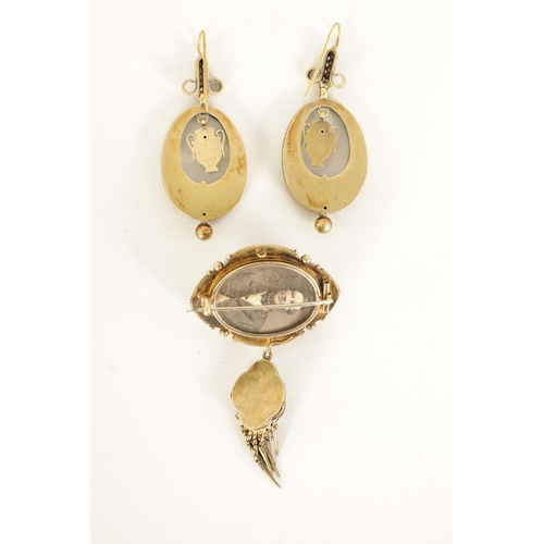 241 - A MID 19TH CENTURY 15CT GOLD, ENAMEL AND PEARL EARRING AND BROOCH SET of neo-classical style with ur... 