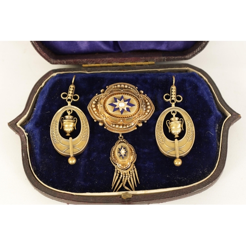 241 - A MID 19TH CENTURY 15CT GOLD, ENAMEL AND PEARL EARRING AND BROOCH SET of neo-classical style with ur... 