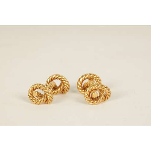 242 - A PAIR OF 18CT GOLD HERMES CUFFLINKS of rope twist design with knot ends, signed 'HERMES' - French h... 