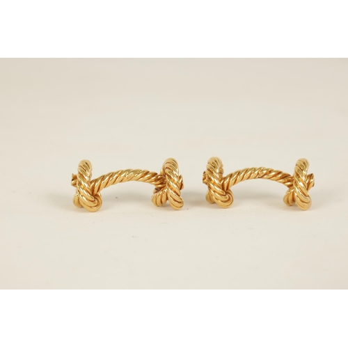 242 - A PAIR OF 18CT GOLD HERMES CUFFLINKS of rope twist design with knot ends, signed 'HERMES' - French h... 