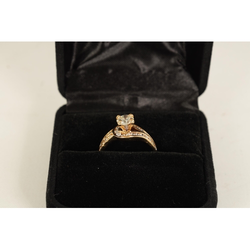 243 - AN 18CT GOLD THIRTY STONE DIAMOND SET SOLITAIRE CLUSTER RING with four-claw raised 'Tiffany' style s... 