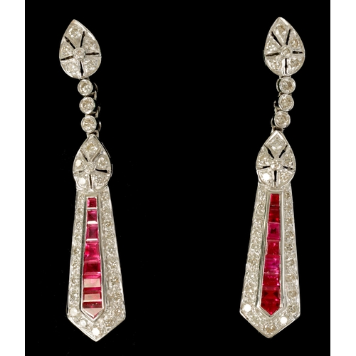 245 - A PAIR OF ART DECCO STYLE 18CT WHITE GOLD, RUBY AND DIAMOND PENDANT DROP EARRINGS of tapering form w... 