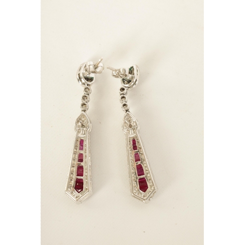 245 - A PAIR OF ART DECCO STYLE 18CT WHITE GOLD, RUBY AND DIAMOND PENDANT DROP EARRINGS of tapering form w... 