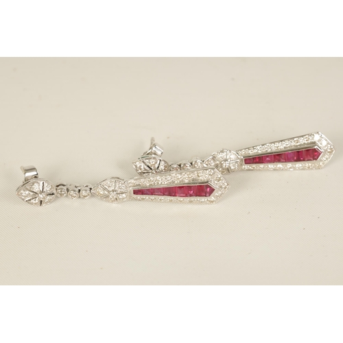 245 - A PAIR OF ART DECCO STYLE 18CT WHITE GOLD, RUBY AND DIAMOND PENDANT DROP EARRINGS of tapering form w... 