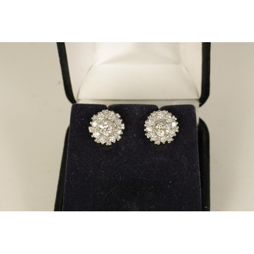 248 - A PAIR OF 18CT WHITE GOLD DIAMOND STUD EARRINGS each with a 4.7mm Victorian cut diamond centre surro... 