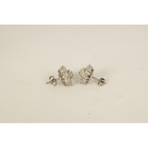 248 - A PAIR OF 18CT WHITE GOLD DIAMOND STUD EARRINGS each with a 4.7mm Victorian cut diamond centre surro... 