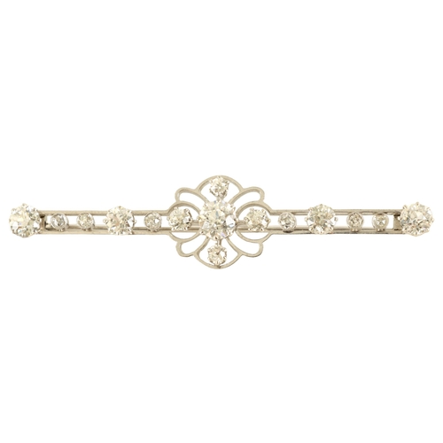 249 - A GOOD PLATINUM AND DIAMOND SET 15 STONE BAR BROOCH the diamonds of exceptional colour and clarity h... 