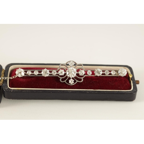 249 - A GOOD PLATINUM AND DIAMOND SET 15 STONE BAR BROOCH the diamonds of exceptional colour and clarity h... 