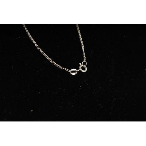 250 - A LADIES 18CT WHITE GOLD SAPPHIRE AND DIAMOND PENDANT on a 9ct white gold chain, the heart-shaped pe... 