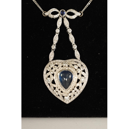 250 - A LADIES 18CT WHITE GOLD SAPPHIRE AND DIAMOND PENDANT on a 9ct white gold chain, the heart-shaped pe... 