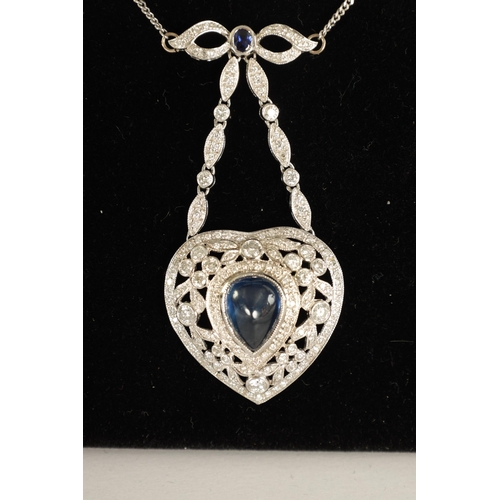 250 - A LADIES 18CT WHITE GOLD SAPPHIRE AND DIAMOND PENDANT on a 9ct white gold chain, the heart-shaped pe... 