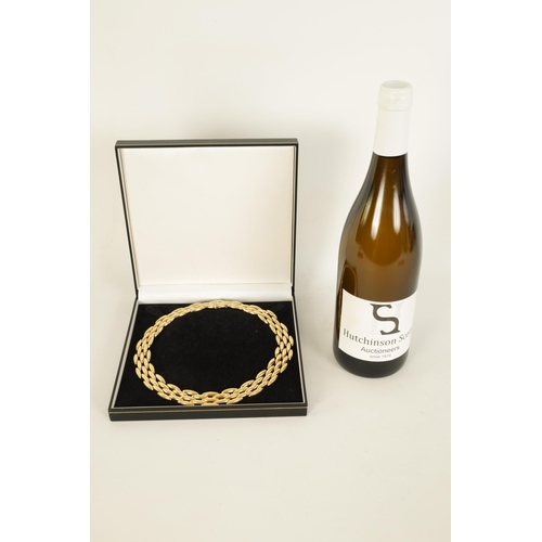 252 - CARTIER. A LADIES 18CT YELLOW GOLD GENTIANE CHOKER NECKLACE the three-row wide articulated choker ne... 