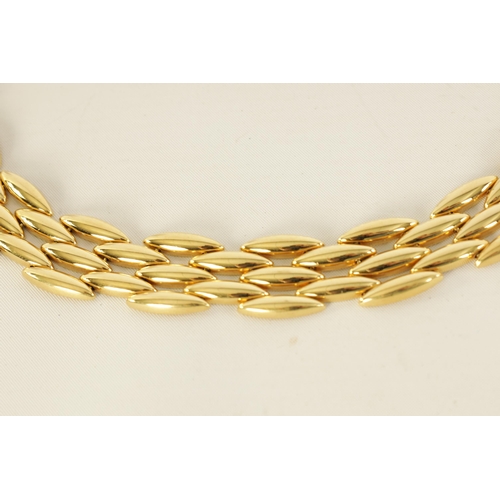 252 - CARTIER. A LADIES 18CT YELLOW GOLD GENTIANE CHOKER NECKLACE the three-row wide articulated choker ne... 