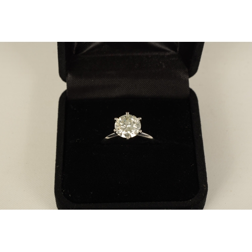 254 - A VERY FINE 18K WHITE GOLD 3CT SOLITAIRE DIAMOND RING the brilliant-cut stone (colour H-I, clarity V... 