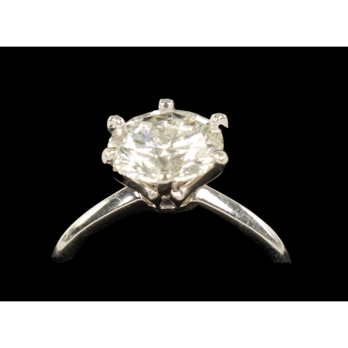 254 - A VERY FINE 18K WHITE GOLD 3CT SOLITAIRE DIAMOND RING the brilliant-cut stone (colour H-I, clarity V... 