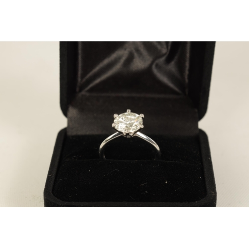 254 - A VERY FINE 18K WHITE GOLD 3CT SOLITAIRE DIAMOND RING the brilliant-cut stone (colour H-I, clarity V... 