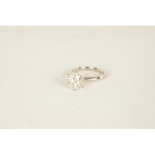 254 - A VERY FINE 18K WHITE GOLD 3CT SOLITAIRE DIAMOND RING the brilliant-cut stone (colour H-I, clarity V... 