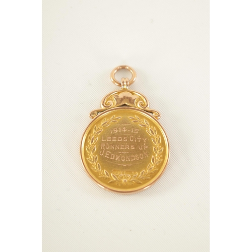 269 - OF FOOTBALL INTEREST - A 9CT GOLD PRESENTATION MEDAL TOGETHER WITH A WALTHAM POCKET WATCH the gold m... 