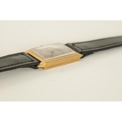 281 - A 1930's GENTLEMAN’S 9CT GOLD WRISTWATCH the rectangular case with bevelled edge enclosing an engine... 